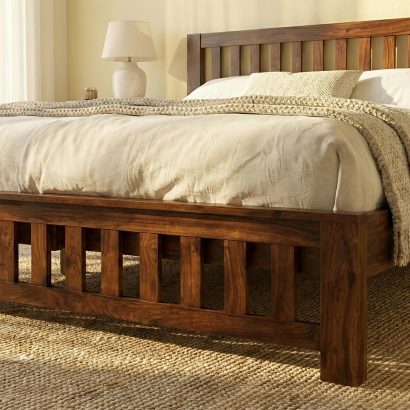 Solid Sheesham Wood Slatted King Size Bed with vertical panel headboard and footboard in a modern bedroom featuring natural wood finish and white bedding.