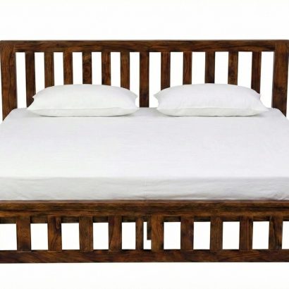 Solid Sheesham Wood Slatted King Size Bed with vertical panel headboard and footboard in a modern bedroom featuring natural wood finish and white bedding.