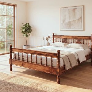 Premium carved wooden bed online made from solid Sheesham wood with an elegant carved headboard and classic spindle design.