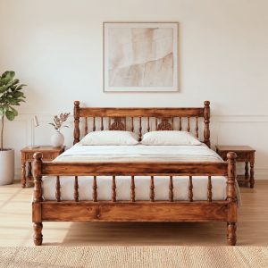 Premium carved wooden bed online made from solid Sheesham wood with an elegant carved headboard and classic spindle design.
