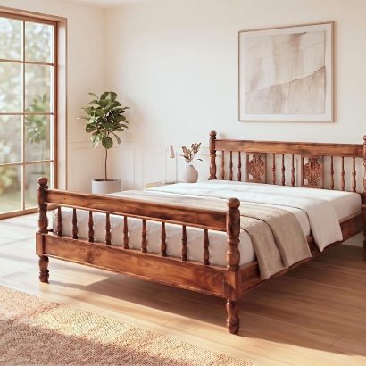 Premium carved wooden bed online made from solid Sheesham wood with an elegant carved headboard and classic spindle design.