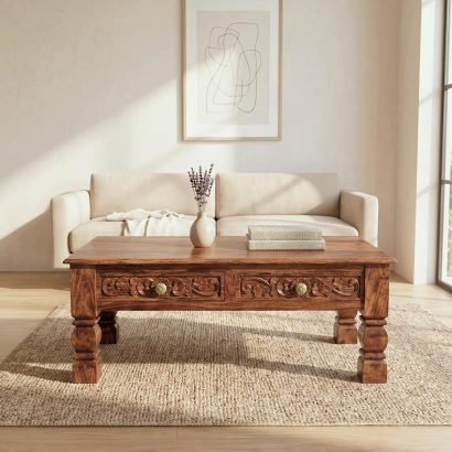 Sheesham wood coffee table with storage drawers and polished finish
