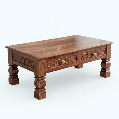 Elegant carved coffee table with drawers in modern interior