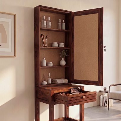 Solid Sheesham wood dressing table with large rectangular mirror and storage drawer, placed in a modern minimalist bedroom with natural lighting.