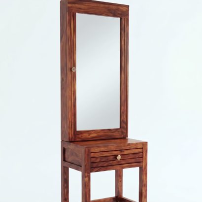 Solid Sheesham wood dressing table with large rectangular mirror and storage drawer, placed in a modern minimalist bedroom with natural lighting.