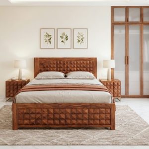 Solid Sheesham wood designer bed featuring a geometric carved headboard and footboard in a modern luxury bedroom