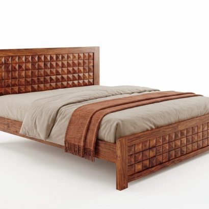 Solid Sheesham wood designer bed featuring a geometric carved headboard and footboard in a modern luxury bedroom