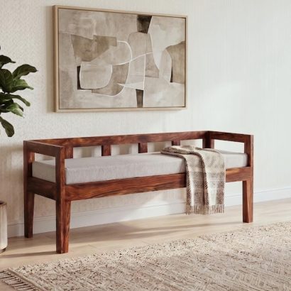 Premium wooden daybed bench with cushion in natural sheesham wood finish.
