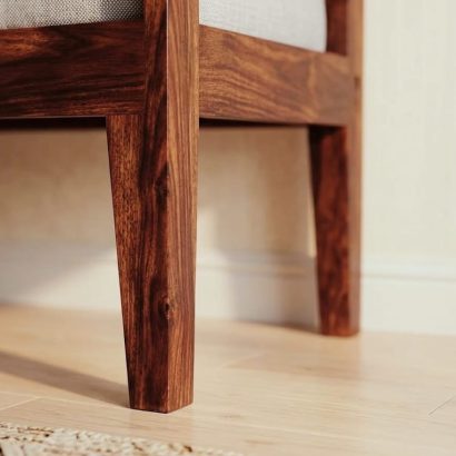 Premium wooden daybed bench with cushion in natural sheesham wood finish.